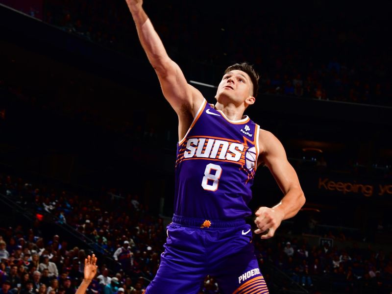 PHOENIX, AZ - JANUARY 7: Grayson Allen #8 of the Phoenix Suns shoots the ball during the game against the Memphis Grizzlies on January 7, 2024 at Footprint Center in Phoenix, Arizona. NOTE TO USER: User expressly acknowledges and agrees that, by downloading and or using this photograph, user is consenting to the terms and conditions of the Getty Images License Agreement. Mandatory Copyright Notice: Copyright 2024 NBAE (Photo by Barry Gossage/NBAE via Getty Images)