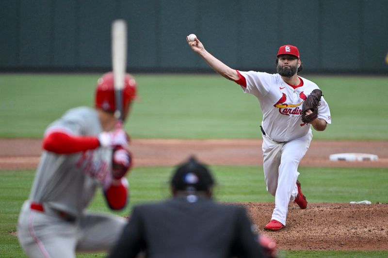Apr 10, 2024; St. Louis, Missouri, USA;  St. Louis Cardinals starting pitcher Lance Lynn (31) pitches to Philadelphia Phillies shortstop Trea Turner (7) during the third inning at Busch Stadium. Mandatory Credit: Jeff Curry-USA TODAY Sports