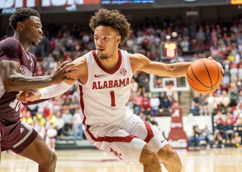 Jan 25, 2023; Tuscaloosa, Alabama, USA; Alabama Crimson Tide guard Mark Sears (1) drives to the basket against Mississippi State Bulldogs guard Dashawn Davis (10) during the second half at Coleman Coliseum. Mandatory Credit: Marvin Gentry-USA TODAY Sports