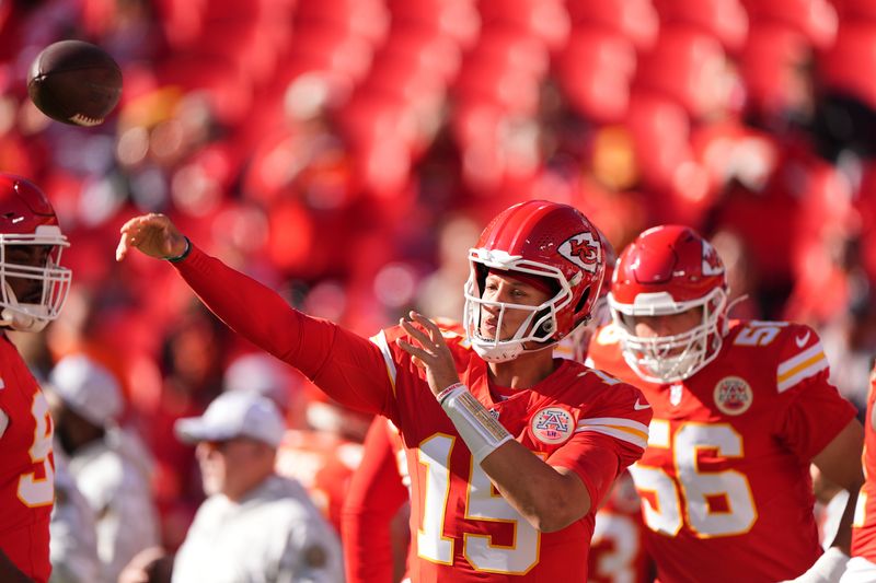 Kansas City Chiefs quarterback Patrick Mahomes warms up before an NFL football game against the Denver Broncos Sunday, Nov. 10, 2024, in Kansas City, Mo. (AP Photo/Charlie Riedel)