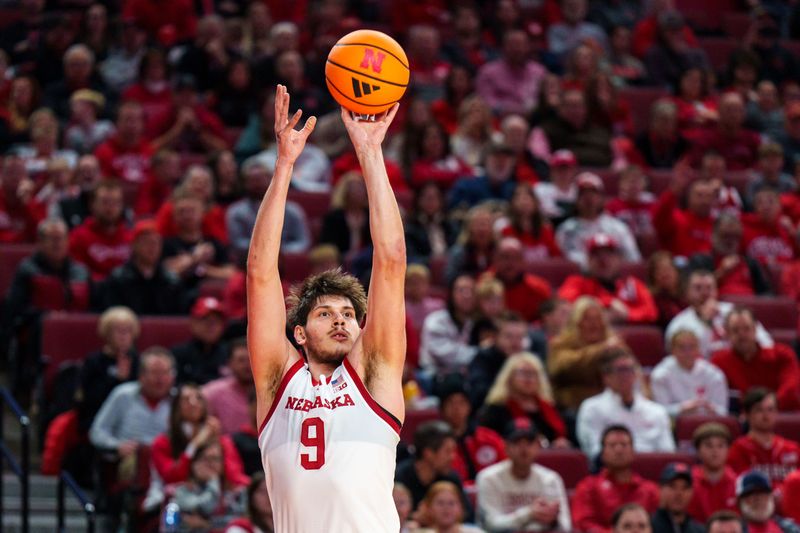 Dec 30, 2025; Lincoln, Nebraska, USA; Nebraska Cornhuskers forward Berke Buyuktuncel (9) shoots the ball against the New Hampshire Wildcats during the first half at Pinnacle Bank Arena. Mandatory Credit: Dylan Widger-Imagn Images