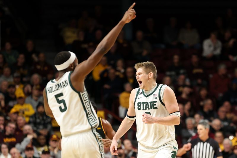 Dec 4, 2024; Minneapolis, Minnesota, USA; Michigan State Spartans forward Jaxon Kohler (0) celebrates during the first half against the Minnesota Golden Gophers at Williams Arena. Mandatory Credit: Matt Krohn-Imagn Images