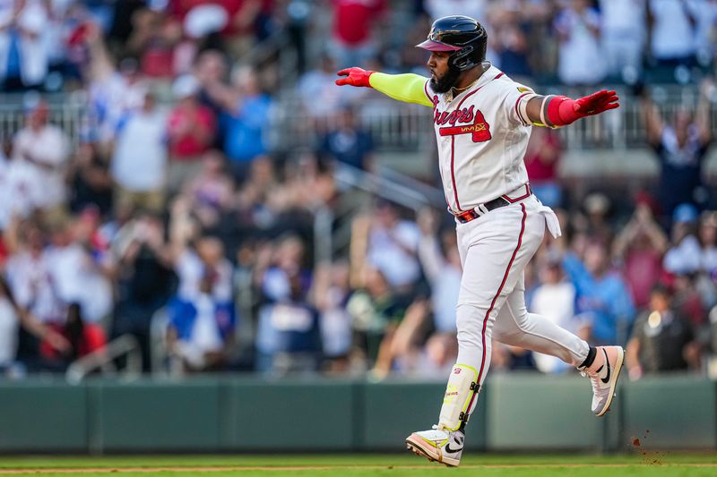 Oct 1, 2023; Cumberland, Georgia, USA; Atlanta Braves designated hitter Marcell Ozuna (20) reacts after hitting a home run against the Washington Nationals to tie the Major League team record for home runs hit in a season during the ninth inning at Truist Park. Mandatory Credit: Dale Zanine-USA TODAY Sports