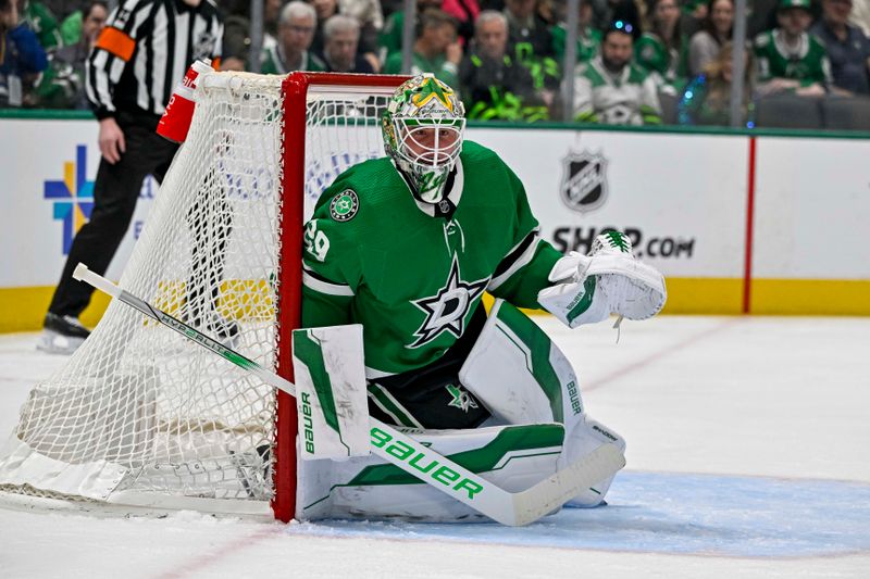 Apr 9, 2024; Dallas, Texas, USA; Dallas Stars goaltender Jake Oettinger (29) faces the Buffalo Sabres attack during the first period at the American Airlines Center. Mandatory Credit: Jerome Miron-USA TODAY Sports