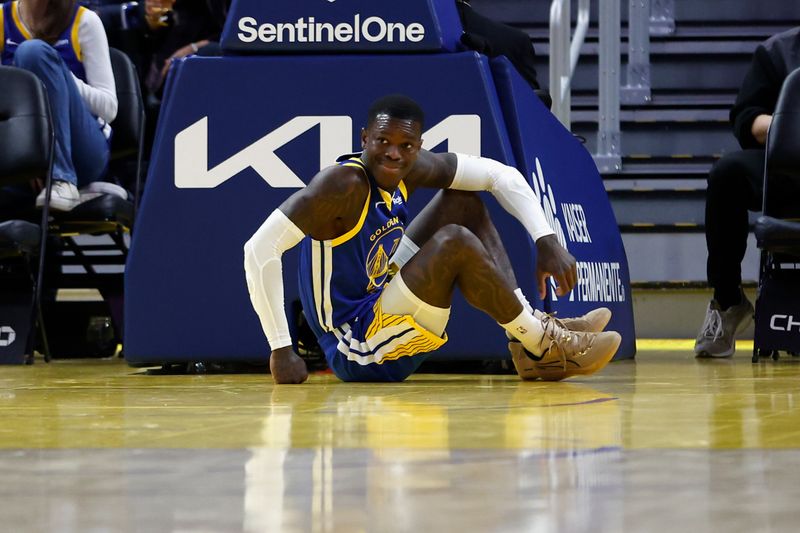 SAN FRANCISCO, CALIFORNIA - JANUARY 28: Dennis Schroder #71 of the Golden State Warriors is slow to his feet after a play in the third quarter against the Utah Jazz at Chase Center on January 28, 2025 in San Francisco, California. NOTE TO USER: User expressly acknowledges and agrees that, by downloading and or using this photograph, User is consenting to the terms and conditions of the Getty Images License Agreement. (Photo by Lachlan Cunningham/Getty Images)