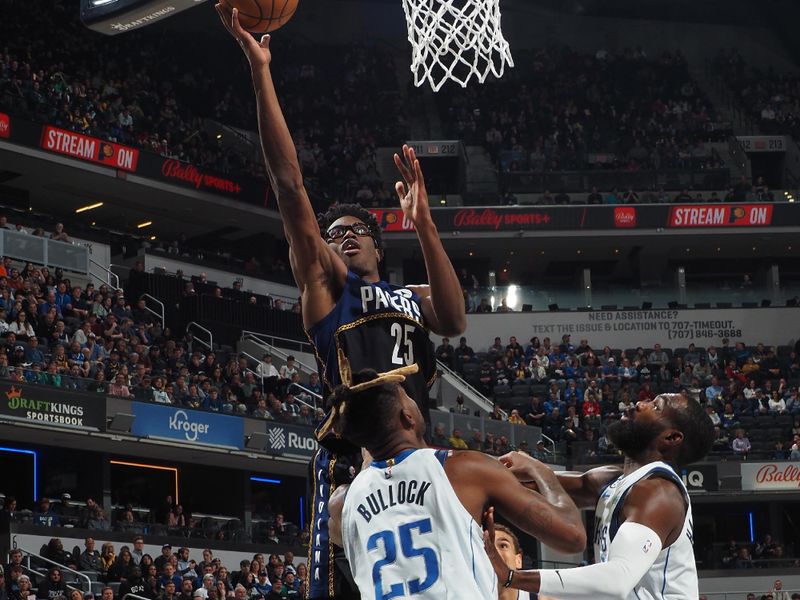 INDIANAPOLIS, IN - MARCH 27: Jalen Smith #25 of the Indiana Pacers drives to the basket during the game against the Dallas Mavericks on March 27, 2023 at Gainbridge Fieldhouse in Indianapolis, Indiana. NOTE TO USER: User expressly acknowledges and agrees that, by downloading and or using this Photograph, user is consenting to the terms and conditions of the Getty Images License Agreement. Mandatory Copyright Notice: Copyright 2023 NBAE (Photo by Ron Hoskins/NBAE via Getty Images)