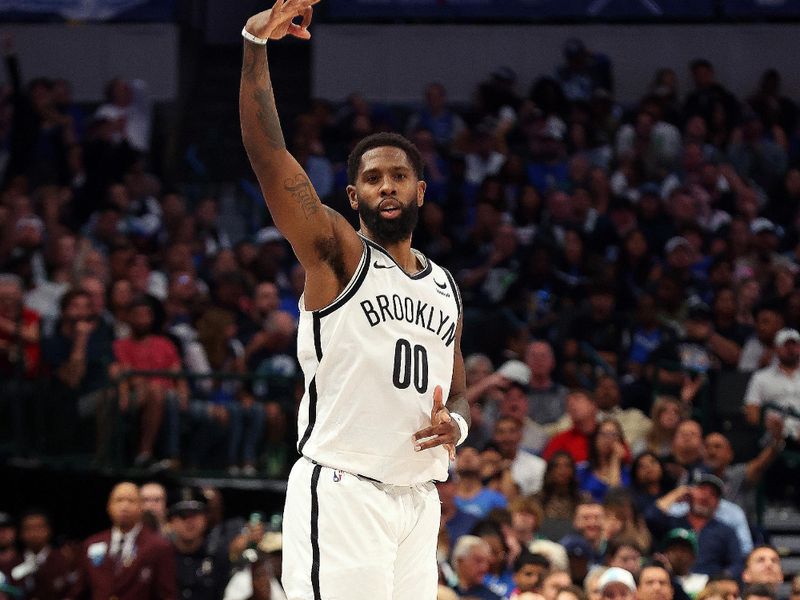 DALLAS, TEXAS - OCTOBER 27: Royce O'Neale #00 of the Brooklyn Nets reacts after hitting a three-pointer in the fourth quarter against the Dallas Mavericks at American Airlines Center on October 27, 2023 in Dallas, Texas. NOTE TO USER: User expressly acknowledges and agrees that, by downloading and or using this photograph, User is consenting to the terms and conditions of the Getty Images License Agreement. (Photo by Richard Rodriguez/Getty Images)