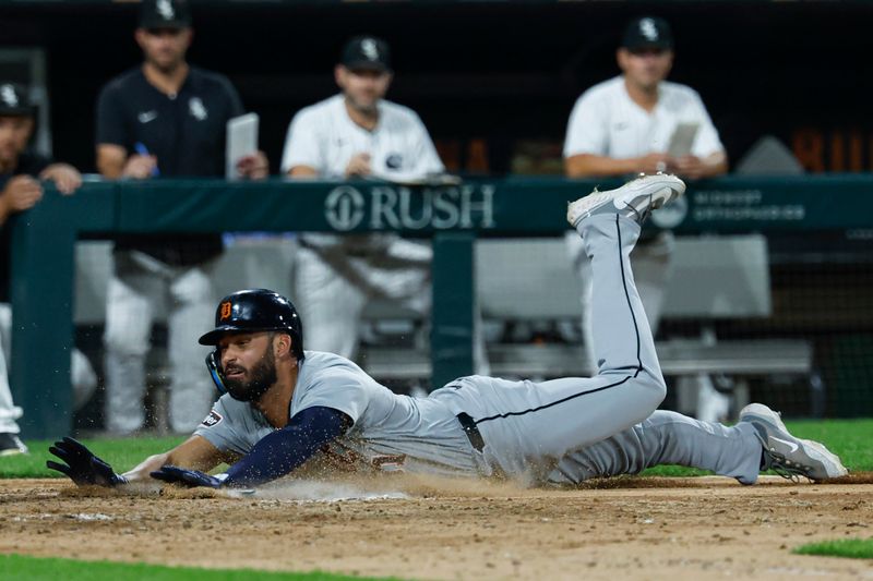 Aug 23, 2024; Chicago, Illinois, USA; Detroit Tigers outfielder Riley Greene (31) scores against the Chicago White Sox during the seventh inning at Guaranteed Rate Field. Mandatory Credit: Kamil Krzaczynski-USA TODAY Sports