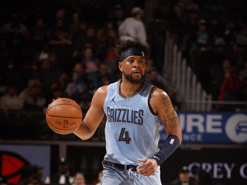 DETROIT, MI - APRIL 1: Jordan Goodwin #4 of the Memphis Grizzlies handles the ball during the game against the Detroit Pistons on April 1, 2024 at Little Caesars Arena in Detroit, Michigan. NOTE TO USER: User expressly acknowledges and agrees that, by downloading and/or using this photograph, User is consenting to the terms and conditions of the Getty Images License Agreement. Mandatory Copyright Notice: Copyright 2024 NBAE (Photo by Brian Sevald/NBAE via Getty Images)