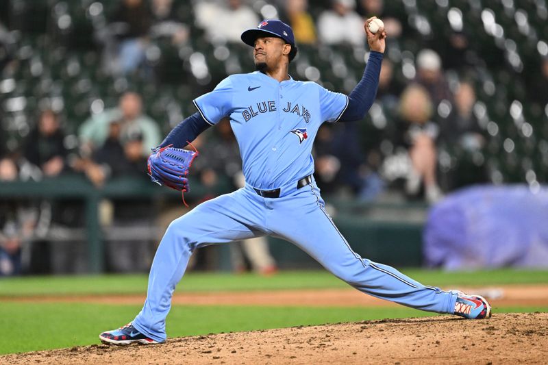 May 28, 2024; Chicago, Illinois, USA;  Toronto Blue Jays pitcher Genesis Cabrera (92) pitches in the eighth inning against the Chicago White Sox at Guaranteed Rate Field. Mandatory Credit: Jamie Sabau-USA TODAY Sports