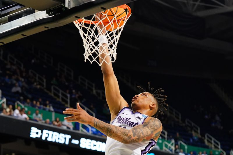 Mar 17, 2023; Greensboro, NC, USA;  Kansas State Wildcats forward Keyontae Johnson (11) shoots in the second half against the Montana State Bobcats at Greensboro Coliseum. Mandatory Credit: John David Mercer-USA TODAY Sports