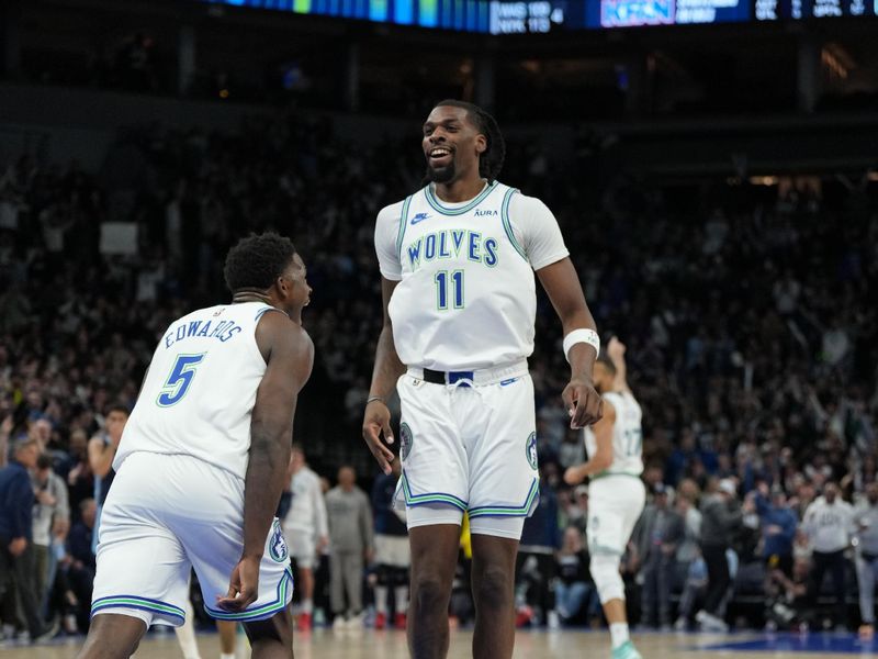 MINNEAPOLIS, MN -  JANUARY 18: Anthony Edwards #5 and Naz Reid #11 of the Minnesota Timberwolves celebrate during the game against the Memphis Grizzlies on January 18, 2024 at Target Center in Minneapolis, Minnesota. NOTE TO USER: User expressly acknowledges and agrees that, by downloading and or using this Photograph, user is consenting to the terms and conditions of the Getty Images License Agreement. Mandatory Copyright Notice: Copyright 2024 NBAE (Photo by Jordan Johnson/NBAE via Getty Images)