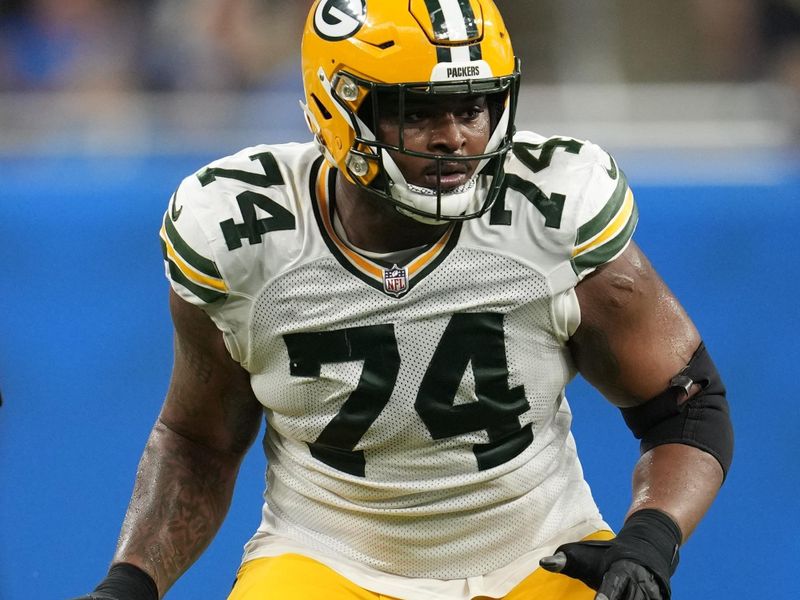 Green Bay Packers guard Elgton Jenkins (74) plays against the Detroit Lions during an NFL football game in Detroit, Sunday, Nov. 6, 2022. (AP Photo/Paul Sancya)