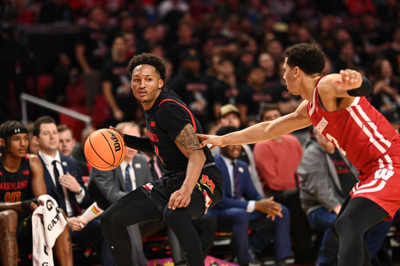 Jan 25, 2023; College Park, Maryland, USA;  Maryland Terrapins guard Jahmir Young (1) drives as Wisconsin Badgers guard Jordan Davis (2) defense during the second half at Xfinity Center. Mandatory Credit: Tommy Gilligan-USA TODAY Sports