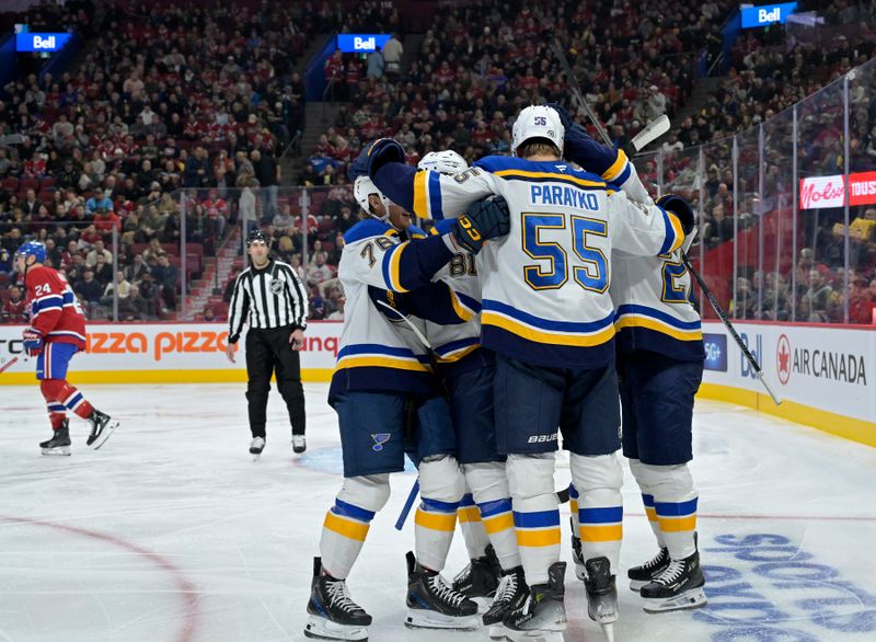 Oct 26, 2024; Montreal, Quebec, CAN; St.Louis Blues defenseman Colton Parayko (55) celebrates with teammates after scoring a goal against the Montreal Canadiens during the second period at the Bell Centre. Mandatory Credit: Eric Bolte-Imagn Images