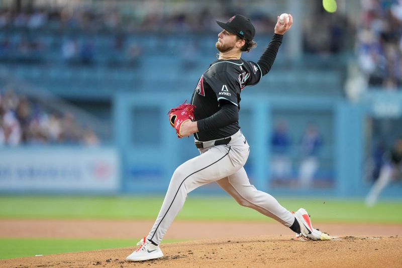 May 20, 2025; Los Angeles, California, USA; Arizona Diamondbacks pitcher Ryne Nelson (19) throws a pitch in the first inning against the Los Angeles Dodgers at Dodger Stadium. Mandatory Credit: Kirby Lee-Imagn Images
