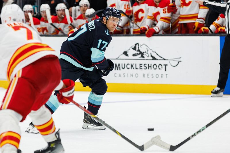 Oct 19, 2024; Seattle, Washington, USA; Seattle Kraken center Jaden Schwartz (17) shoots against the Calgary Flames during the third period at Climate Pledge Arena. Mandatory Credit: Caean Couto-Imagn Images