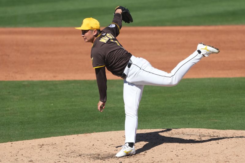 Feb 25, 2025; Peoria, Arizona, USA; San Diego Padres pitcher Yuki Matsui (1) throws against the Los Angeles Angels during the fifth inning at Peoria Sports Complex. Mandatory Credit: Rick Scuteri-Imagn Images