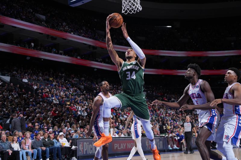 PHILADELPHIA, PA - FEBRUARY 25: Giannis Antetokounmpo #34 of the Milwaukee Bucks drives to the basket during the game against the Philadelphia 76ers on February 25, 2024 at the Wells Fargo Center in Philadelphia, Pennsylvania NOTE TO USER: User expressly acknowledges and agrees that, by downloading and/or using this Photograph, user is consenting to the terms and conditions of the Getty Images License Agreement. Mandatory Copyright Notice: Copyright 2024 NBAE (Photo by Jesse D. Garrabrant/NBAE via Getty Images)