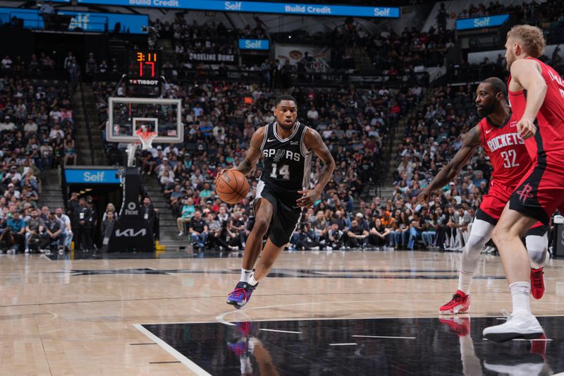 SAN ANTONIO, TX - MARCH 12: Blake Wesley #14 of the San Antonio Spurs dribbles the ball during the game against the Houston Rockets on March 12, 2024 at the Frost Bank Center in San Antonio, Texas. NOTE TO USER: User expressly acknowledges and agrees that, by downloading and or using this photograph, user is consenting to the terms and conditions of the Getty Images License Agreement. Mandatory Copyright Notice: Copyright 2024 NBAE (Photos by Jesse D. Garrabrant/NBAE via Getty Images)