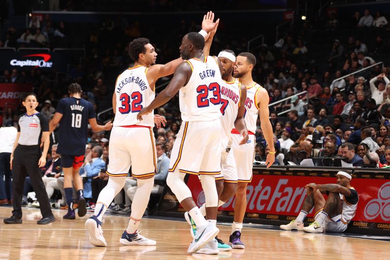 WASHINGTON, DC -? NOVEMBER 04:  Golden State Warriorrs players =celebrate during the game against the Washington Wizardson November 04 2024 at Capital One Arena in Washington, DC. NOTE TO USER: User expressly acknowledges and agrees that, by downloading and or using this Photograph, user is consenting to the terms and conditions of the Getty Images License Agreement. Mandatory Copyright Notice: Copyright 2024 NBAE (Photo by Kenny Giarla/NBAE via Getty Images)