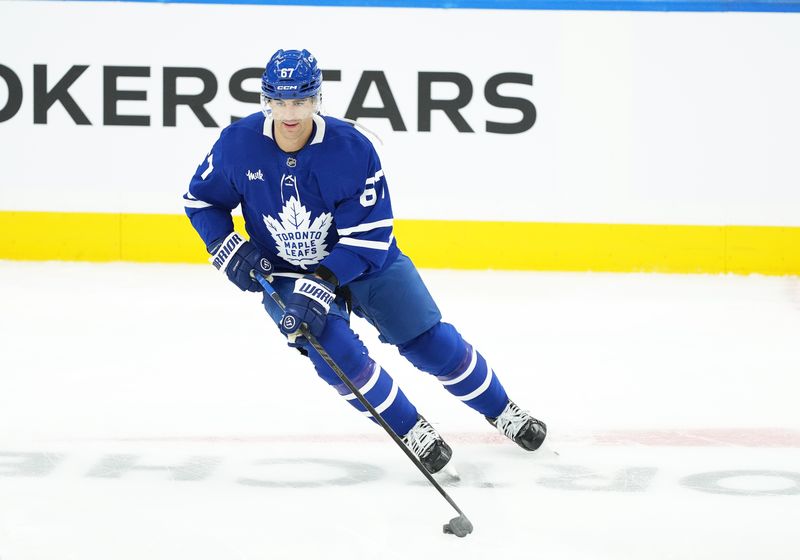 Oct 12, 2024; Toronto, Ontario, CAN; Toronto Maple Leafs left wing Max Pacioretty (67) skates during the warmup before a game against the Pittsburgh Penguins at Scotiabank Arena. Mandatory Credit: Nick Turchiaro-Imagn Images