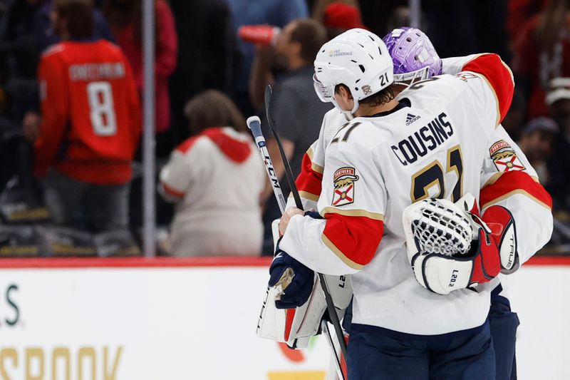 Nov 8, 2023; Washington, District of Columbia, USA; Florida Panthers center Nick Cousins (21) celebrates with Panthers goaltender Sergei Bobrovsky (72) after their game against the Washington Capitals at Capital One Arena. Mandatory Credit: Geoff Burke-USA TODAY Sports