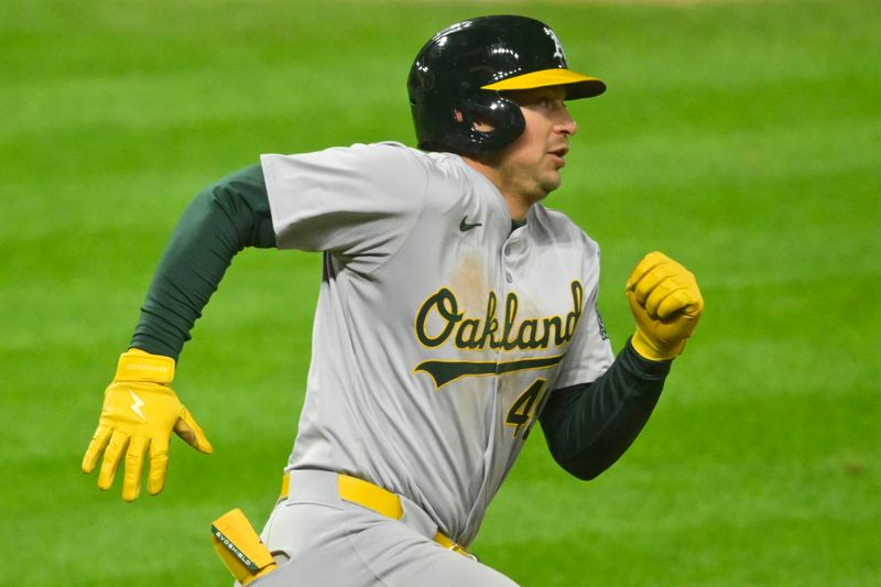 Apr 20, 2024; Cleveland, Ohio, USA; Oakland Athletics first baseman Ryan Noda (49) runs out a double in the ninth inning against the Cleveland Guardians at Progressive Field. Mandatory Credit: David Richard-USA TODAY Sports