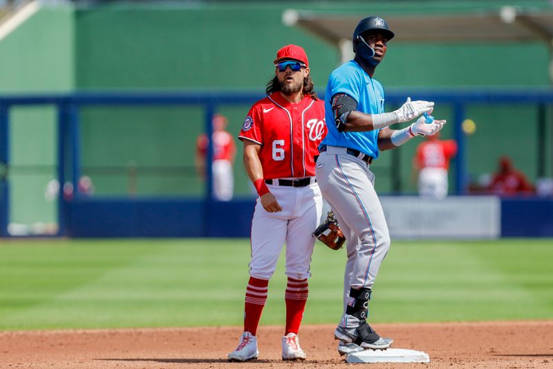 Mar 2, 2023; West Palm Beach, Florida, USA; Miami Marlins right fielder Jesus Sanchez (7) reacts from second bae after hitting a double during the second inning against the Washington Nationals at The Ballpark of the Palm Beaches. Mandatory Credit: Sam Navarro-USA TODAY Sports