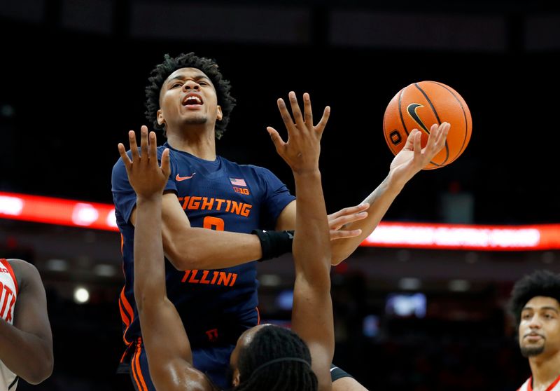 Feb 26, 2023; Columbus, Ohio, USA;  Illinois Fighting Illini guard Terrence Shannon Jr. (0) loses the ball as Ohio State Buckeyes guard Bruce Thornton (2) defends during the first half at Value City Arena. Mandatory Credit: Joseph Maiorana-USA TODAY Sports