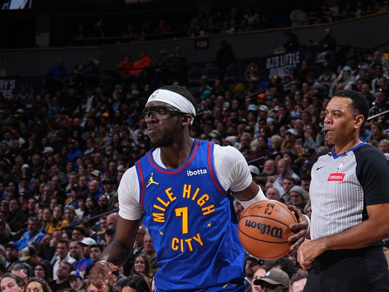 DENVER, CO - MARCH 5: Reggie Jackson #7 of the Denver Nuggets dribbles the ball during the game against the Phoenix Suns on March 5, 2024 at the Ball Arena in Denver, Colorado. NOTE TO USER: User expressly acknowledges and agrees that, by downloading and/or using this Photograph, user is consenting to the terms and conditions of the Getty Images License Agreement. Mandatory Copyright Notice: Copyright 2024 NBAE (Photo by Garrett Ellwood/NBAE via Getty Images)