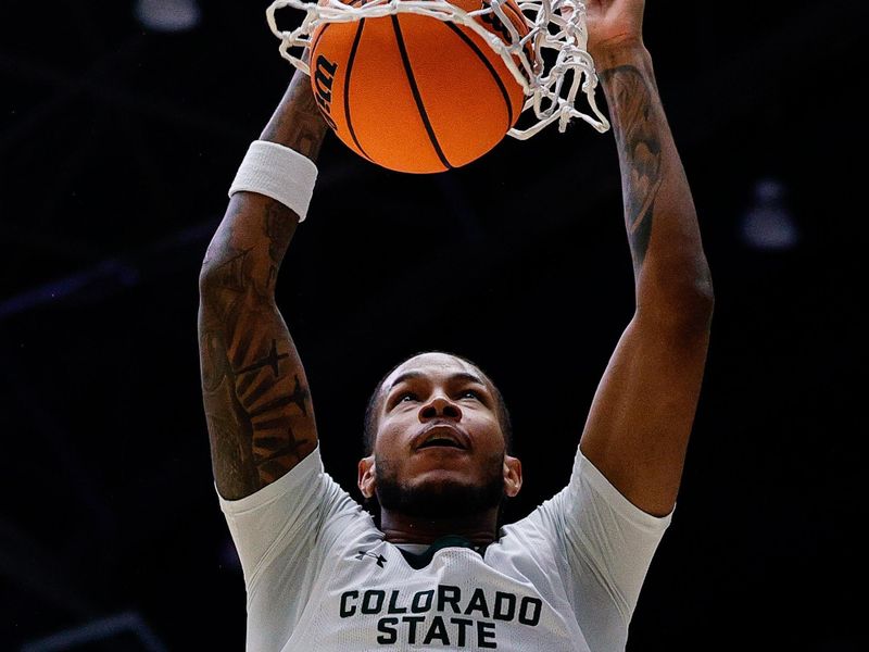 Mar 1, 2025; Fort Collins, Colorado, USA; Colorado State Rams forward Jaylen Crocker-Johnson (8) dunks the ball in the first half against the Utah State Aggies at Moby Arena. Mandatory Credit: Isaiah J. Downing-Imagn Images