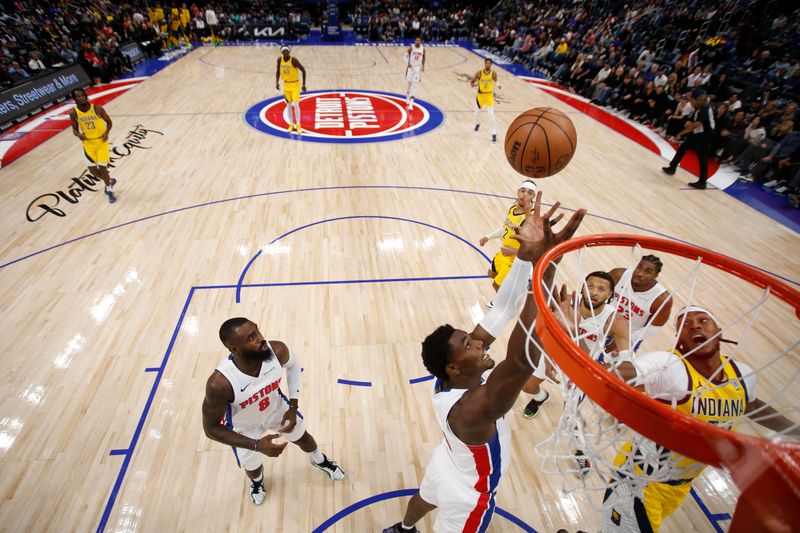 DETROIT, MI - OCTOBER 23: Jalen Duren #0 of the Detroit Pistons grabs the rebound during the game against the Indiana Pacers on October 23, 2024 at Little Caesars Arena in Detroit, Michigan. NOTE TO USER: User expressly acknowledges and agrees that, by downloading and/or using this photograph, User is consenting to the terms and conditions of the Getty Images License Agreement. Mandatory Copyright Notice: Copyright 2024 NBAE (Photo by Brian Sevald/NBAE via Getty Images)