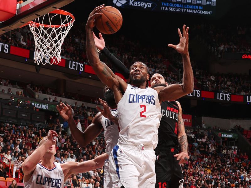 MIAMI, FL - FEBRUARY 4: Kawhi Leonard #2 of the LA Clippers rebounds the ball during the game against the Miami Heat on February 4, 2024 at Kaseya Center in Miami, Florida. NOTE TO USER: User expressly acknowledges and agrees that, by downloading and or using this Photograph, user is consenting to the terms and conditions of the Getty Images License Agreement. Mandatory Copyright Notice: Copyright 2024 NBAE (Photo by Issac Baldizon/NBAE via Getty Images)