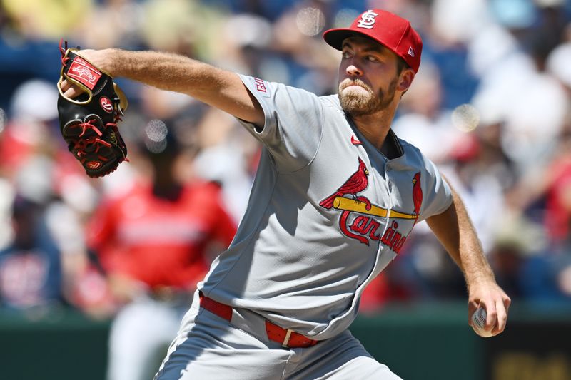 Jun 29, 2025; Cleveland, Ohio, USA; St. Louis Cardinals starting pitcher Matthew Liberatore (52) throws a pitch during the first inning against the Cleveland Guardians at Progressive Field. Mandatory Credit: Ken Blaze-Imagn Images