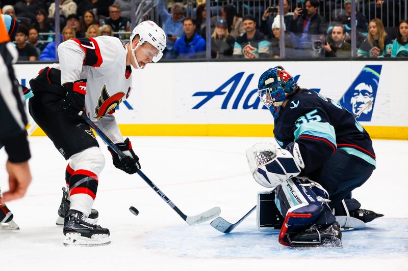 Jan 4, 2024; Seattle, Washington, USA; Ottawa Senators left wing Brady Tkachuk (7) reacts to a deflection by Seattle Kraken goaltender Joey Daccord (35) during the first period at Climate Pledge Arena. Mandatory Credit: Joe Nicholson-USA TODAY Sports