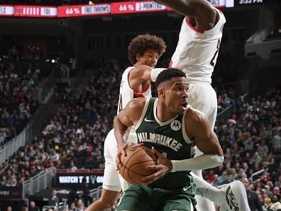 MILWAUKEE, WI - NOVEMBER 26: Giannis Antetokounmpo #34 of the Milwaukee Bucks handles the ball during the game against the Portland Trail Blazers on November 26, 2023 at the Fiserv Forum Center in Milwaukee, Wisconsin. NOTE TO USER: User expressly acknowledges and agrees that, by downloading and or using this Photograph, user is consenting to the terms and conditions of the Getty Images License Agreement. Mandatory Copyright Notice: Copyright 2023 NBAE (Photo by Jeff Haynes/NBAE via Getty Images).