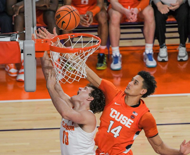 Feb 22, 2023; Clemson, South Carolina, USA; Clemson sophomore forward Ben Middlebrooks (10) shoots against Syracuse center Jesse Edwards (14) during the first half at Littlejohn Coliseum. Mandatory Credit: Ken Ruinard-USA TODAY Sports