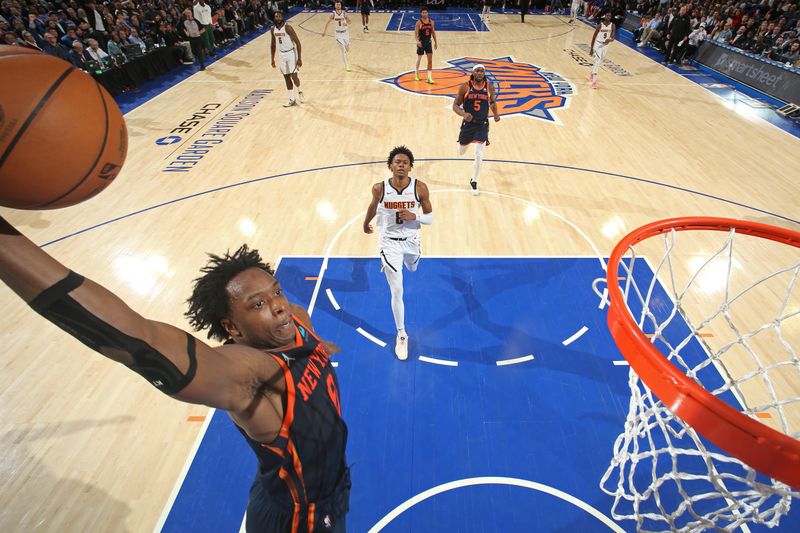 NEW YORK, NY - JANUARY 25: OG Anunoby #8 of the New York Knicks dunks the ball during the game against the Denver Nuggets on January 25, 2024 at Madison Square Garden in New York City, New York.  NOTE TO USER: User expressly acknowledges and agrees that, by downloading and or using this photograph, User is consenting to the terms and conditions of the Getty Images License Agreement. Mandatory Copyright Notice: Copyright 2024 NBAE  (Photo by Nathaniel S. Butler/NBAE via Getty Images)