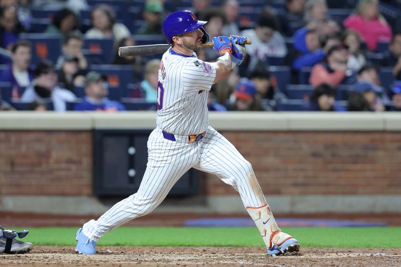 Apr 12, 2024; New York City, New York, USA; New York Mets first baseman Pete Alonso (20) follows through on a solo home run against the Kansas City Royals during the eighth inning at Citi Field. Mandatory Credit: Brad Penner-USA TODAY Sports