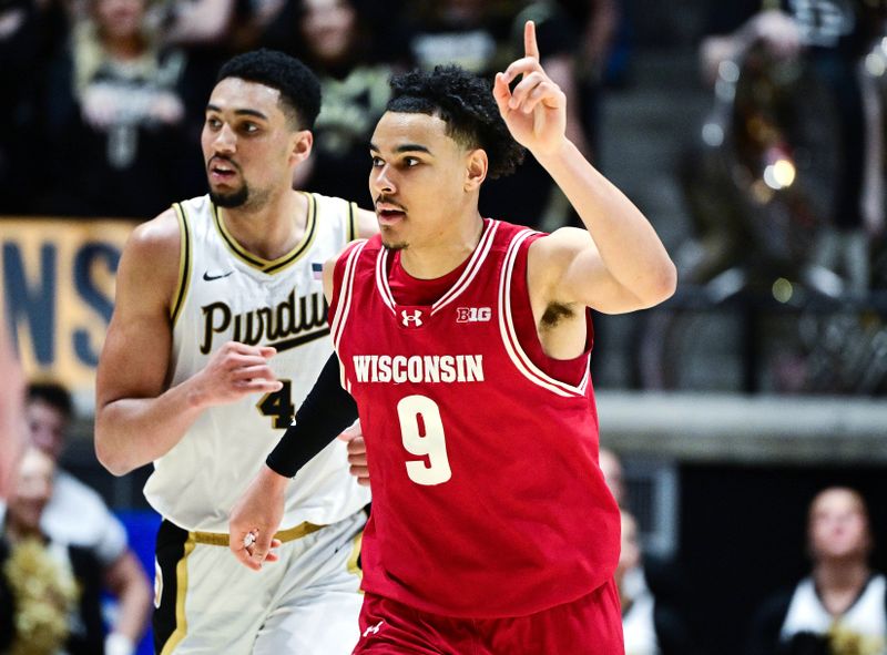 Feb 15, 2025; West Lafayette, Indiana, USA; Wisconsin Badgers guard John Tonje (9) celebrates making a basket during the second half agains the Purdue Boilermakers at Mackey Arena. Mandatory Credit: Marc Lebryk-Imagn Images