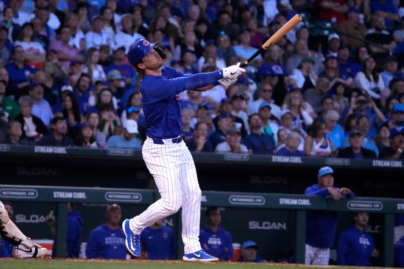 Mar 12, 2024; Mesa, Arizona, USA; Chicago Cubs second baseman Nico Hoerner (2) hits against the Milwaukee Brewers in the second inning at Sloan Park. Mandatory Credit: Rick Scuteri-USA TODAY Sports