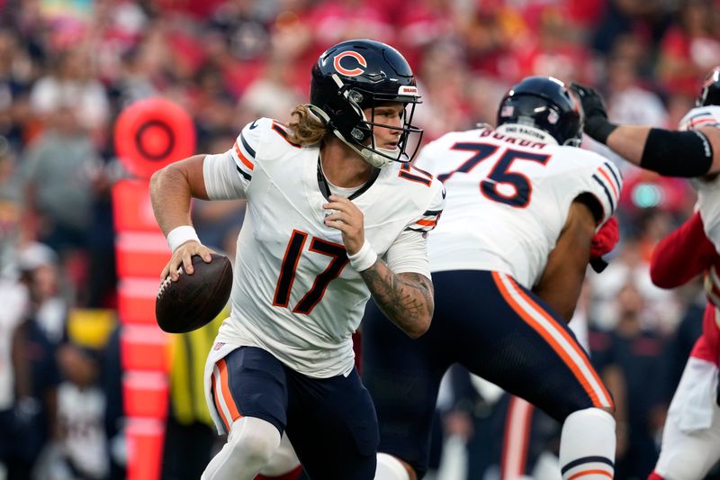 Chicago Bears quarterback Tyson Bagent rolls out during the first half of an NFL preseason football game against the Kansas City Chiefs Thursday, Aug. 22, 2024, in Kansas City, Mo. (AP Photo/Ed Zurga)