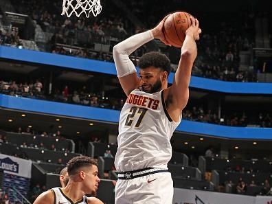 CHARLOTTE, NC - DECEMBER 23: Jamal Murray #27 of the Denver Nuggets grabs a rebound during the game against the Charlotte Hornets on December 23, 2023 at Spectrum Center in Charlotte, North Carolina. NOTE TO USER: User expressly acknowledges and agrees that, by downloading and or using this photograph, User is consenting to the terms and conditions of the Getty Images License Agreement. Mandatory Copyright Notice: Copyright 2023 NBAE (Photo by Kent Smith/NBAE via Getty Images)