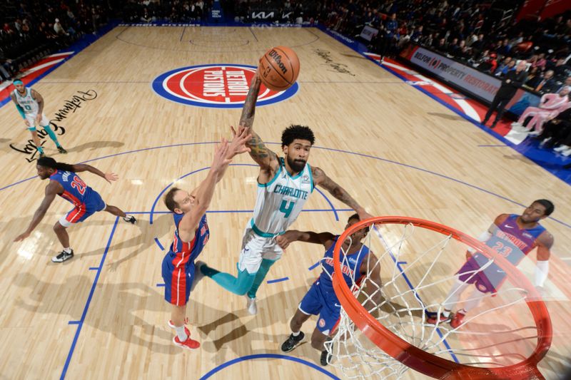 DETROIT, MI - JANUARY 24: Nick Richards #4 of the Charlotte Hornets drives to the basket during the game against the Detroit Pistons on January 24, 2024 at Little Caesars Arena in Detroit, Michigan. NOTE TO USER: User expressly acknowledges and agrees that, by downloading and/or using this photograph, User is consenting to the terms and conditions of the Getty Images License Agreement. Mandatory Copyright Notice: Copyright 2024 NBAE (Photo by Chris Schwegler/NBAE via Getty Images)