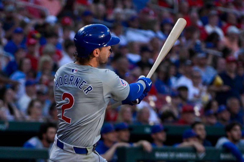 May 25, 2024; St. Louis, Missouri, USA;  Chicago Cubs second baseman Nico Hoerner (2) hits a one run double against the St. Louis Cardinals during the fourth inning at Busch Stadium. Mandatory Credit: Jeff Curry-USA TODAY Sports