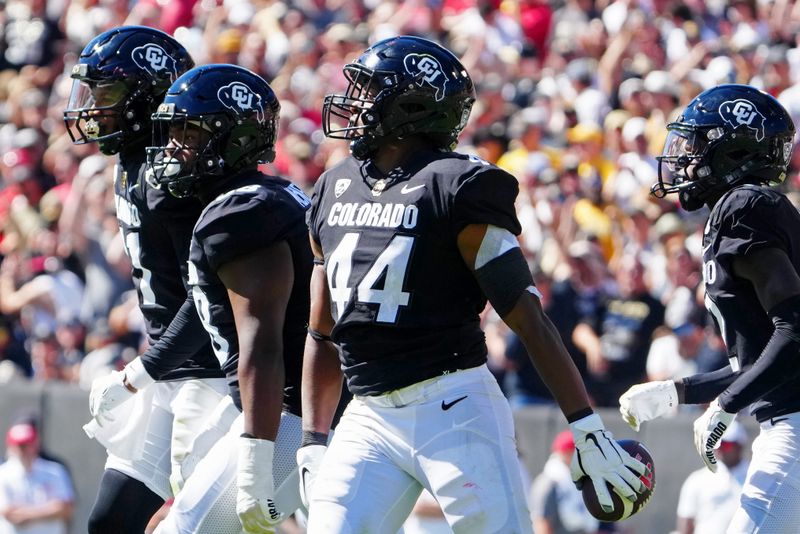 Sep 9, 2023; Boulder, Colorado, USA; Colorado Buffaloes linebacker Jordan Domineck (44) reacts after recovering a fumble against the Nebraska Cornhuskers in the second quarter at Folsom Field. Mandatory Credit: Ron Chenoy-USA TODAY Sports