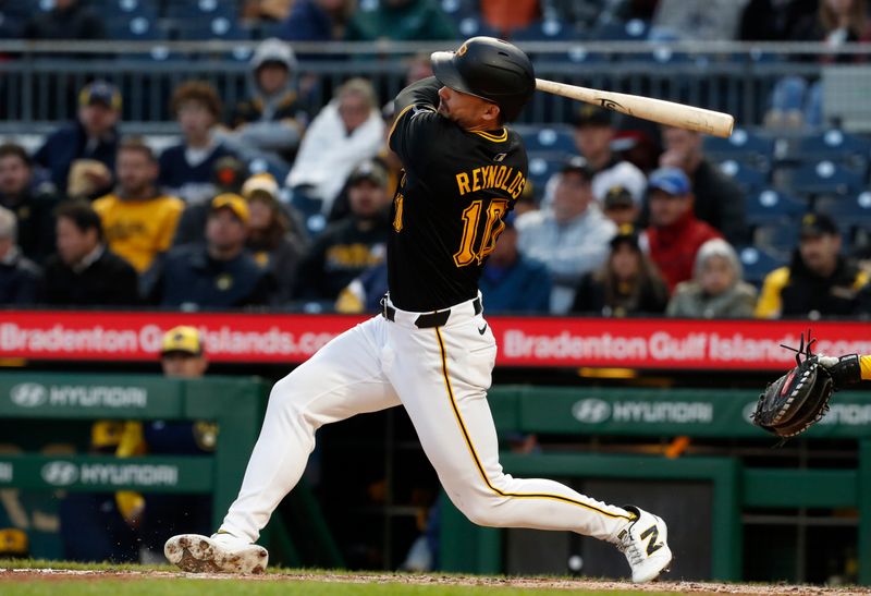 Apr 24, 2024; Pittsburgh, Pennsylvania, USA;  Pittsburgh Pirates designated hitter Bryan Reynolds (10) hits a two run home run against the Milwaukee Brewers during the third inning at PNC Park. Mandatory Credit: Charles LeClaire-USA TODAY Sports