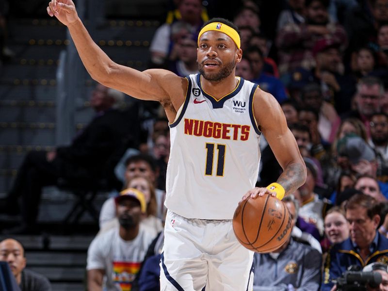 DENVER, CO - APRIL 9: Bruce Brown #11 of the Denver Nuggets dribbles the ball during the game against the Sacramento Kings on April 9, 2023 at the Ball Arena in Denver, Colorado. NOTE TO USER: User expressly acknowledges and agrees that, by downloading and/or using this Photograph, user is consenting to the terms and conditions of the Getty Images License Agreement. Mandatory Copyright Notice: Copyright 2023 NBAE (Photo by Garrett Ellwood/NBAE via Getty Images)