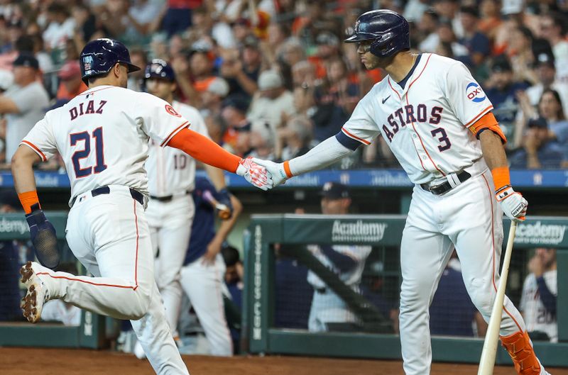 Jun 22, 2024; Houston, Texas, USA; Houston Astros catcher Yainer Diaz (21) celebrates with shortstop Jeremy Pena (3) after scoring a run during the second inning against the Baltimore Orioles at Minute Maid Park. Mandatory Credit: Troy Taormina-USA TODAY Sports